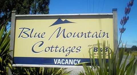 Blue Mountain Cottages roadside sign